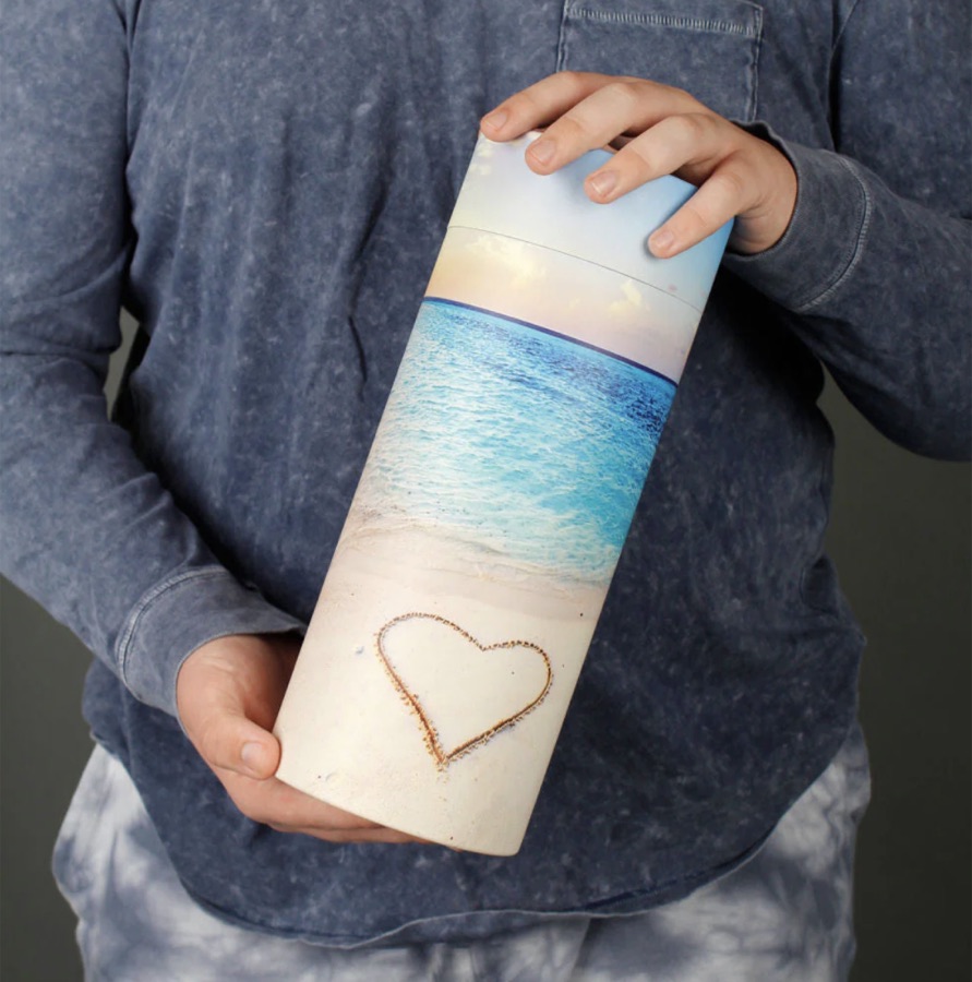 Scattering tube with a beach and heart-in-the-sand design